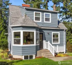 Turret-style bay window looks out from kitchen