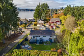 Overhead view of property and lake  from backyard