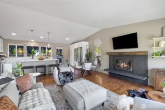 Additional view of the living room and kitchen