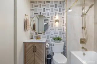 Main bath has had a full remodel with extensive tile work, new tub, lighting and vanity