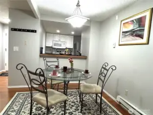 dining room and view into kitchen