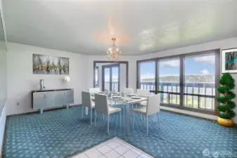 Main dining room off main living room and kitchen. The view really sets a beautiful ambience when dining in the evening and ESPECIALLY during sunrise.