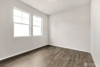 Den off the entry. Pictures are for representational purposes only, colors and features may vary.