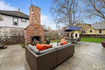 Outdoor living with woodburning fireplace