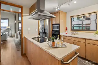 This kitchen is located in the best part of the home.  Easy access to guests with plenty of working space.