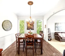 Unique windows frame nature and make for a great dinner party backdrop