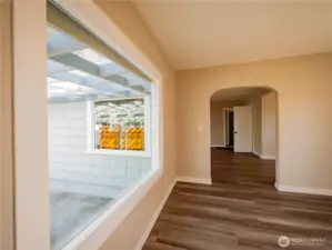 LOVE THE COVED ENTRY INTO THE DINING/DEN/OFFICE AREA