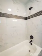 TILED TUB SURROUND...