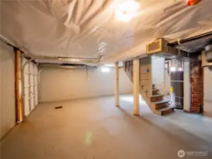 GARAGE OR BASEMENT...FINISH IT FOR MORE LIVING SPACE??