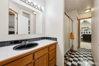 Upstairs bathroom with extra finished room attached..