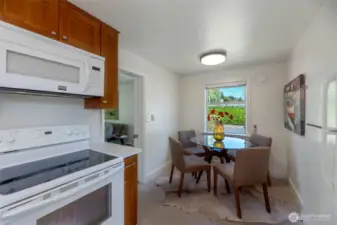 Dining nook in kitchen, great light during the day