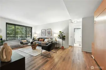 Here you can see how open & spacious the living area is with the picturesque treed outlook.