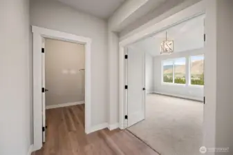 The laundry is just off the primary bedroom for convenience.