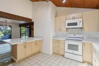 lovely.....Kitchen so much room and windows to view outdoors at every turn.