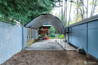 Covered parking on side of 2 car detached garage
