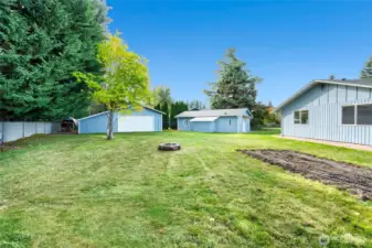 Large backyard with veggie gardens