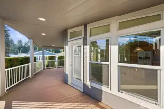 A side door leads to a generous patio, offering ample space for dining, lounging, and entertaining outdoors.