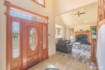 Impressive entryway with soaring ceilings and abundant natural light.