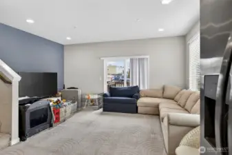 Comfortable upstairs family room with contemporary finishes and plenty of natural light