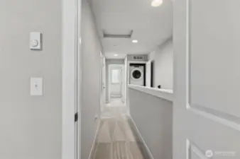3rd floor master bedroom hallway corridor with clean sightlines leading to all bedrooms and bathrooms