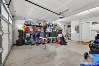 Attached two-car garage with ample storage space and direct interior access