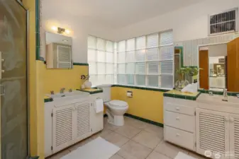 Primary bedroom ensuite bathroom with shower and soaking tub.