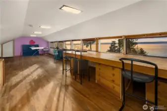 Head upstairs to an open attic that makes for an ideal office or playroom! The perfect flex space with a view!