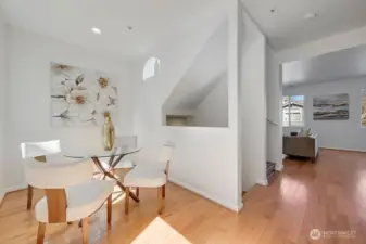 Charming breakfast nook sits just off the kitchen, offering a bright and airy spot for casual dining. Framed by soft natural light and a clean, contemporary design, the space features a stylish dining area that flows effortlessly toward the private backyard. It’s the perfect everyday gathering place, blending comfort, function, and an inviting connection to the outdoors.