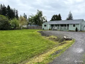 Fresh gravel driveway and in back parking area by your 748 SqFt shop