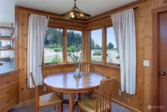 Eating area in the main home overlooks the garden.