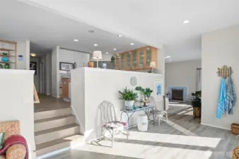 Looking up to kitchen from dining area