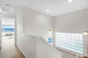 Light stairwell with glass block window to all upper bedrooms