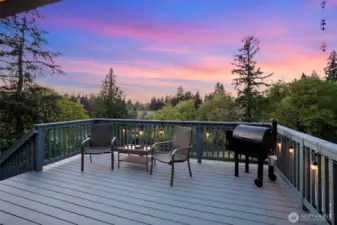 Enjoy sunset views and open-air vibes from the spacious deck, just off the living room—perfect for indoor-outdoor living.