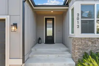 This spacious entry sets the tone with timeless style and room for personalized touches—perfect for seasonal decor that makes your home feel festive year-round.