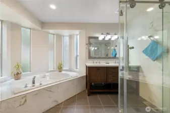 Nicely updated primary bath with walk in shower and jetted tub!