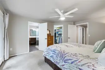 Primary bedroom with 5 piece bath and walk in closet.