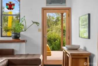 Peekaboo shot out to the patio space accessed through the living area and the pantry.