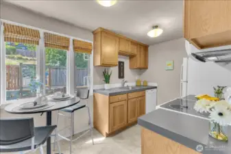 Kitchen with eating space by the windows