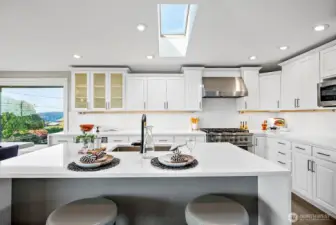 Skylights let in even more light to your updated, chef's kitchen.