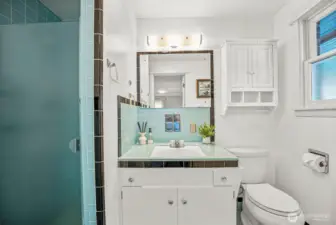 Junior suite bathroom perfect for those that still appreciate the MCM style. This bath has been well preserved and is just adorable!