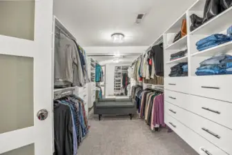 Primary suite walk in closet.