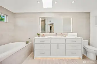 This primary bathroom is the definition of spa like!