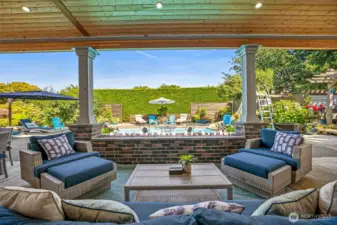 Finally, out back to the amazing back yard! This is 850sq ft of covered patio space complete with tongue and groove fir ceiling and gas plumbed fireplace.