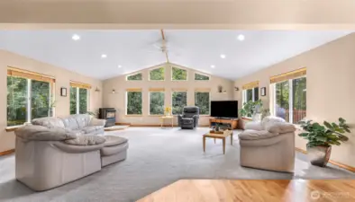 Open great room with lots of windows offering tons of natural light