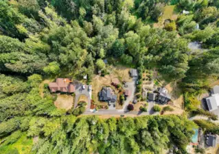 Your new home on the left offers privacy and tranquility, surrounded by trees and set on a quiet dead-end street.