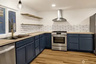 Kitchen-  new stainless  steel appliances - gas stove