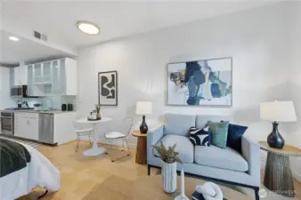 Main living area of this fabulous studio style home with space to enjoy living & dining area for entertaining!