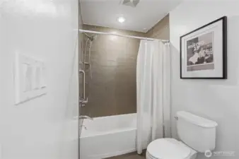 Beautiful tile bath & showerhead.