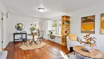 Can we say charming? Cute? Adorable? Absolutely! The original softwood floors set the tone, and the custom built-ins - crafted by the seller - add so much character, functionality, and warmth throughout.