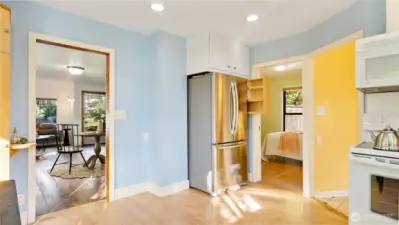 Check out the pull-out next to the fridge - another clever feature the seller custom built and installed! He even crafted the cupboard above the fridge, making sure no space went to waste.